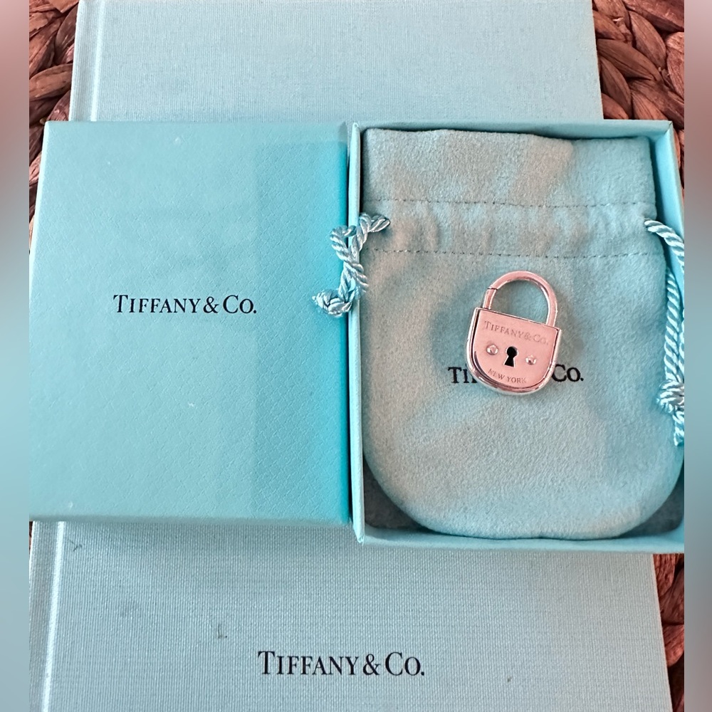 Authentic Tiffany and Co silver pad lock charm and pendant